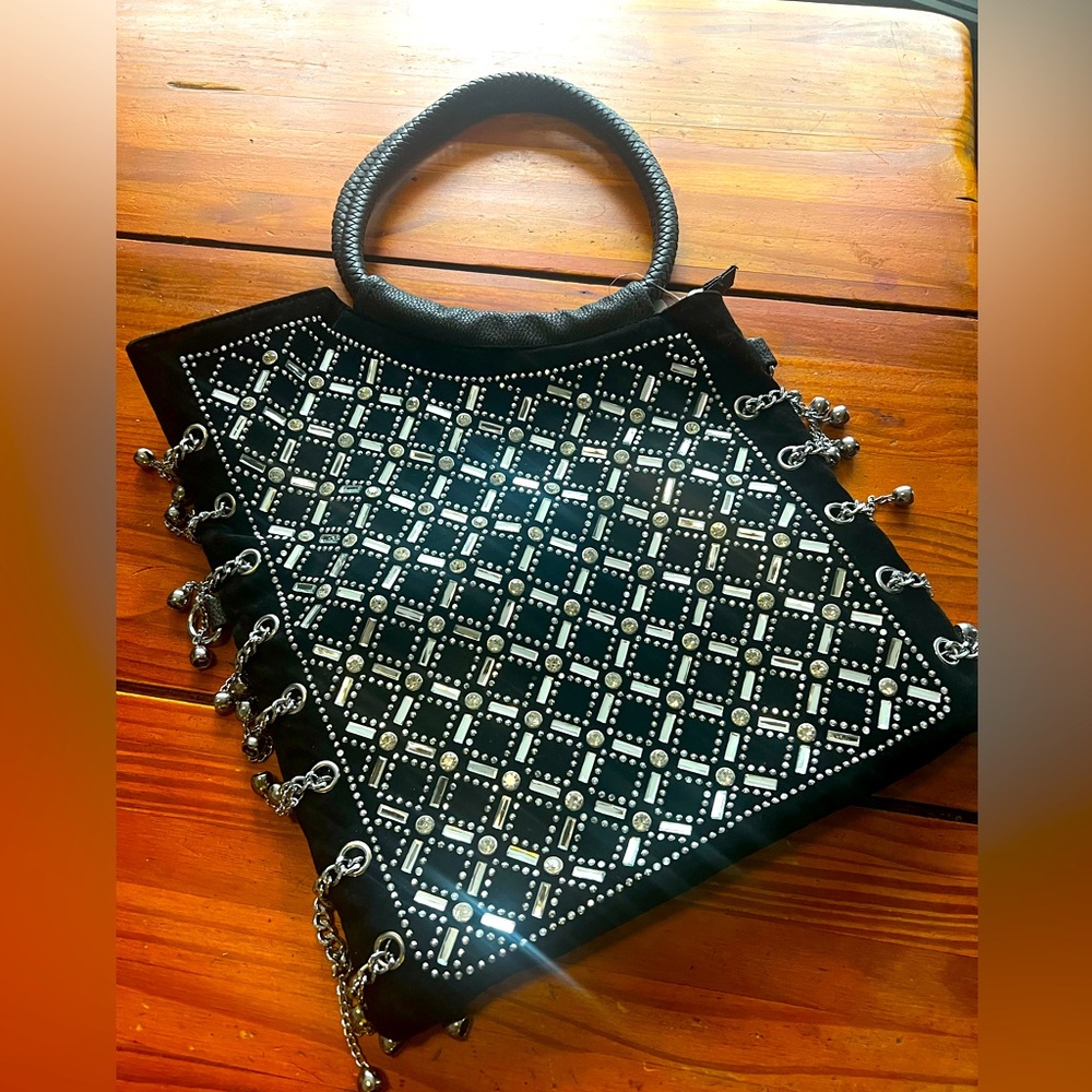 Unique Rock and Roll 90s purse. Pristine condition inside and out.